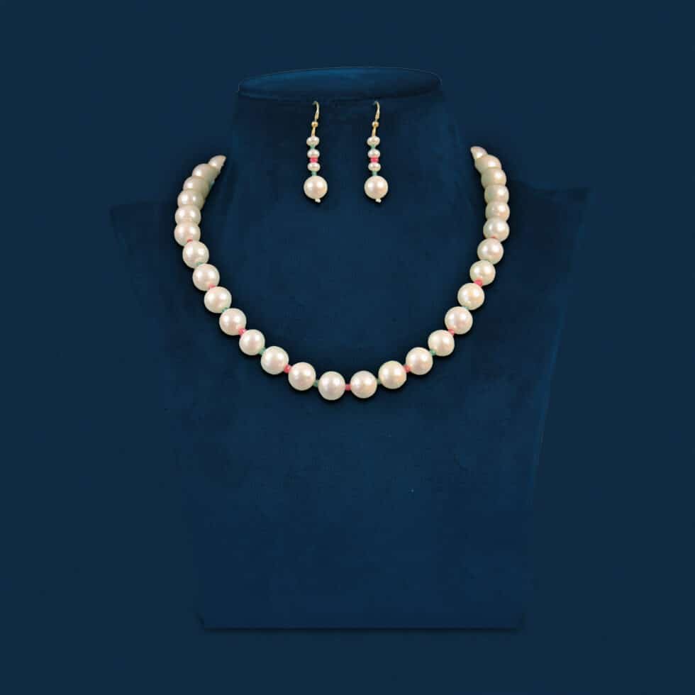 white round pearls with cz stone set