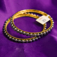 Black button shape pearls bangles